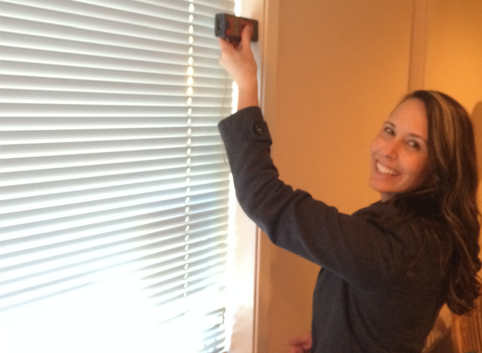 Shauna Scott, an active HeroWork volunteer and employee of Ruffell & Brown, taking measurements at the CCC project. 